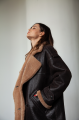 Women's sheepskin coat made of natural sheepskin in dark chocolate color